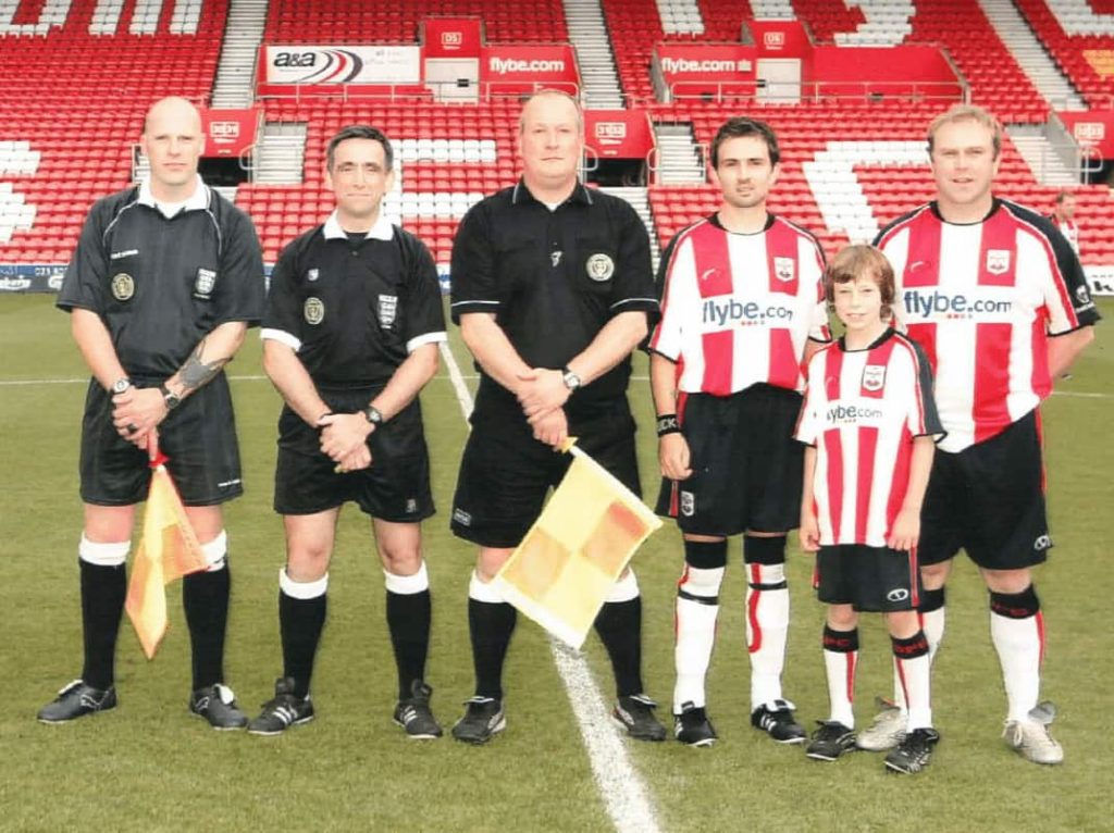 Paul Newman refereeing match with Jason Dodd