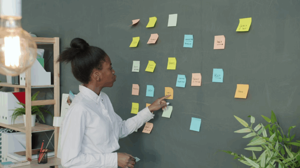 lady planning with sticky notes in an office setting